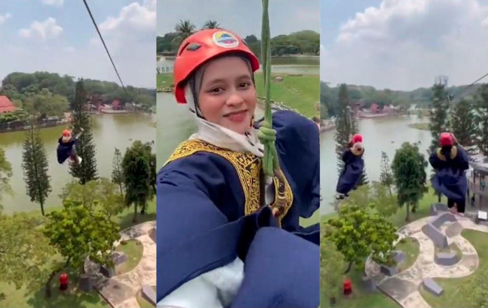 Shah Alam university graduates celebrate by ziplining in graduation robes