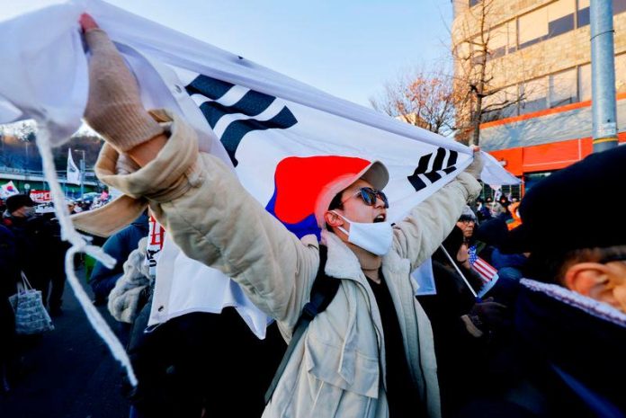 South Korea’s Yoon, facing unprecedented arrest over martial law, vows to ‘fight til end’