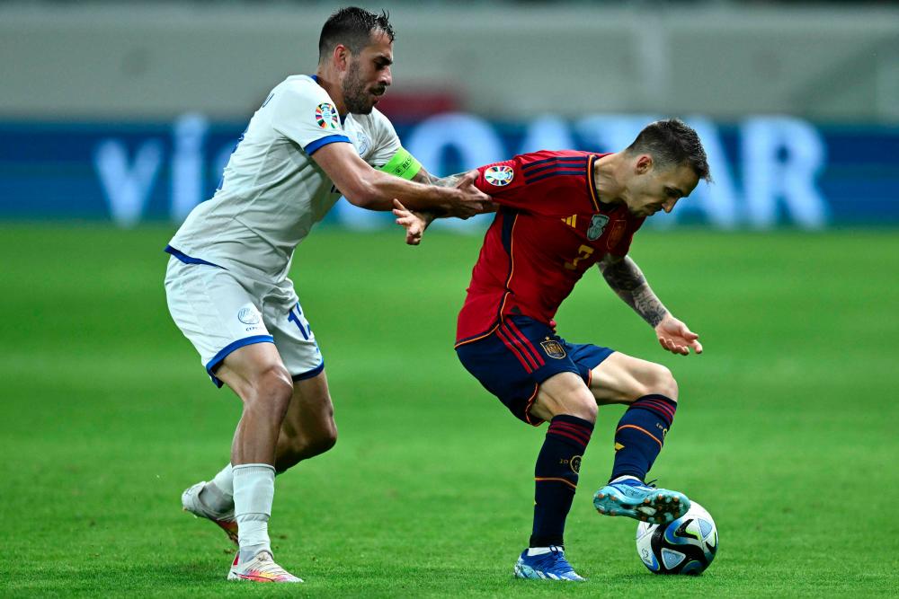Spain close in on top spot with Cyprus win Spain close in on top spot with Cyprus win