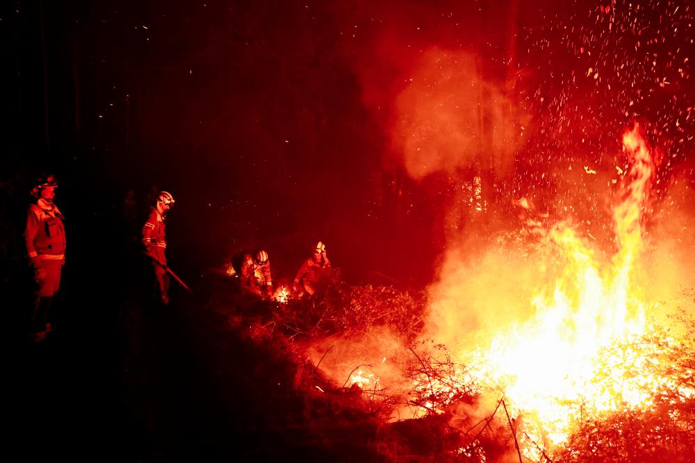 Spain wildfires ‘under control’ as weather conditions improve