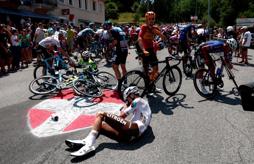 Spectator identified as cause of Tour de France mass crash Spectator identified as cause of Tour de France mass crash