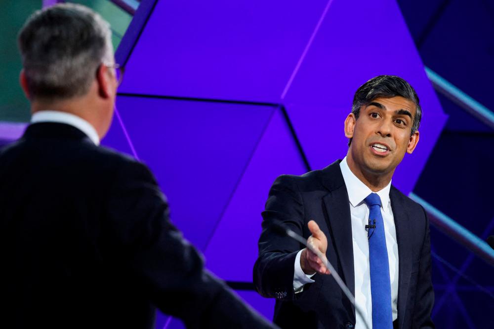 Sunak and Starmer clash in testy final UK TV debate Sunak and Starmer clash in testy final UK TV debate