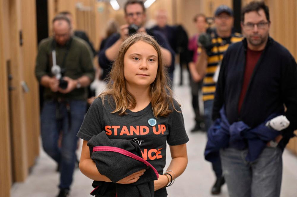 Swedish court fines Thunberg again for disobeying police orders Swedish court fines Thunberg again for disobeying police orders