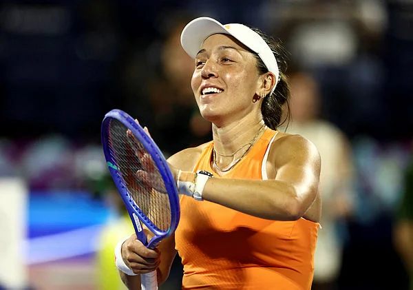 TENNIS-DUBAI Pegula fights back to beat Anisimova in Dubai semi-final