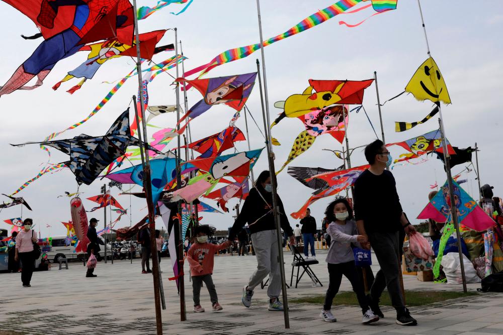 Taiwanese celebrate freedom in the face of China’s war games