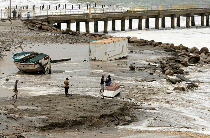 Three dead as massive waves slam Peru, Ecuador and Chile Three dead as massive waves slam Peru, Ecuador and Chile