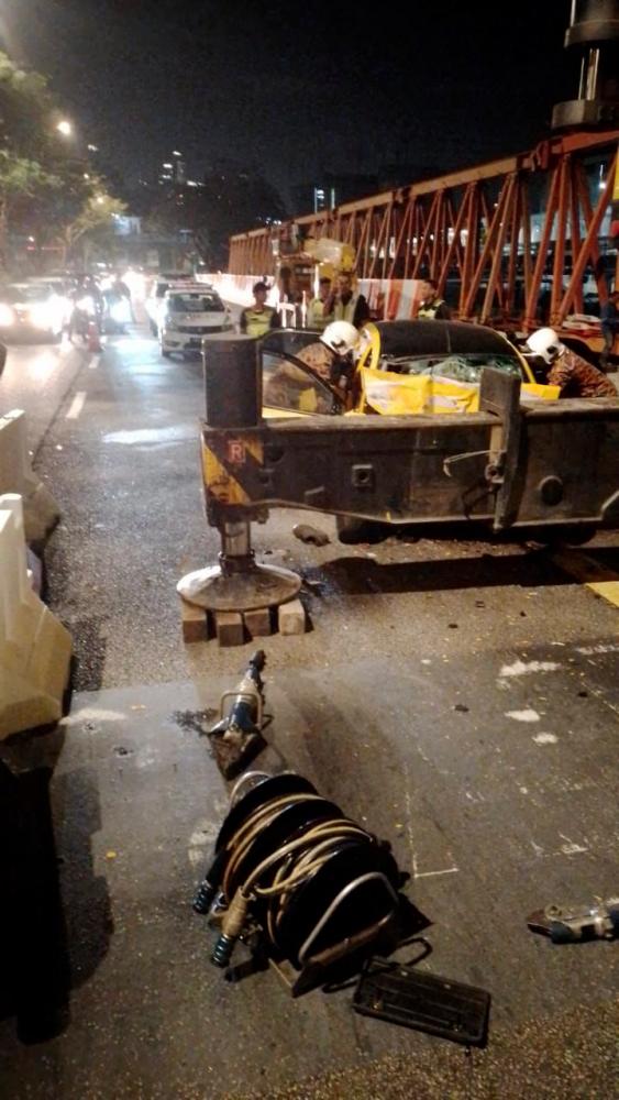 Three killed as car crashes into crane