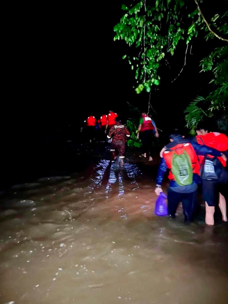 Three killed, three missing in Sabah water surge Three killed, three missing in Sabah water surge