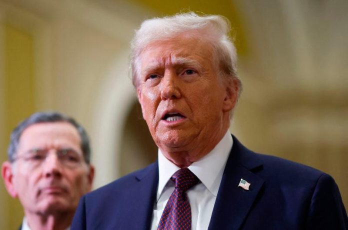 Trump says arranging a meeting with Putin