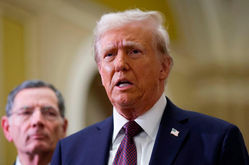 Trump says arranging a meeting with Putin