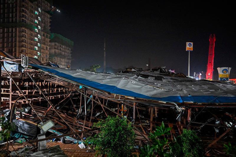 Twelve dead, 60 injured in India billboard collapse Twelve dead, 60 injured in India billboard collapse