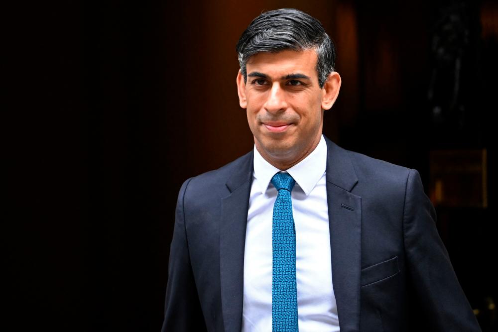 UK PM Sunak apologises for 'horrific' abuse of LGBT military