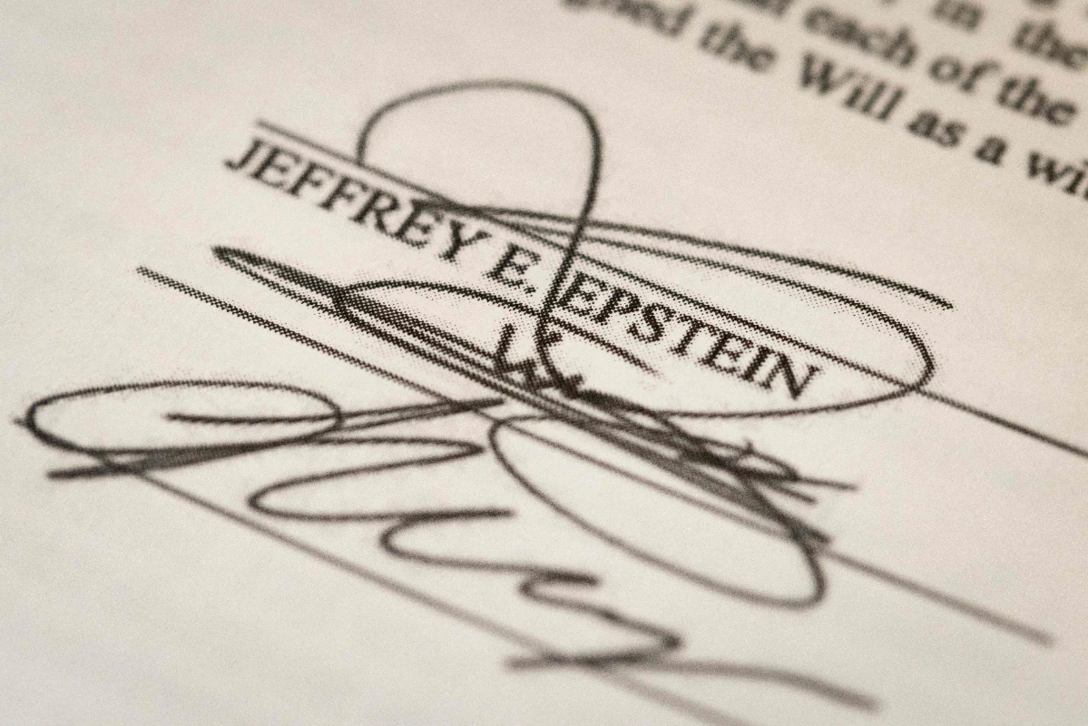 US-JUSTICE-DEPARTMENT-RELEASES-LARGE-SWATH-OF-REDACTED-EPSTEIN-F-203631