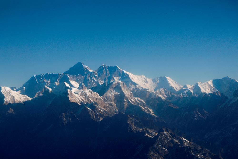 US climber claims rare Everest ‘triple crown’