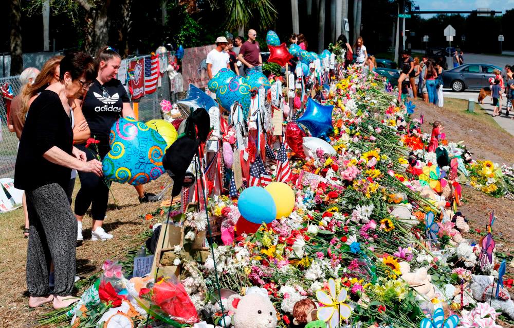 US school guard not guilty of failing to stop mass shooting