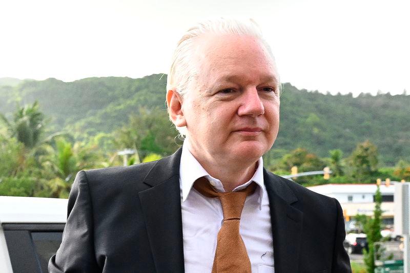 WikiLeaks founder Assange returns home a free man WikiLeaks founder Assange returns home a free man