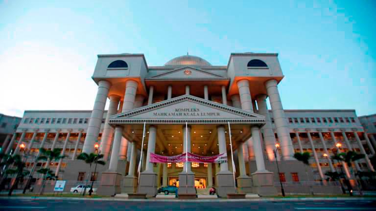 Woman charged with concealing money belonging to Singaporean businessman Woman charged with concealing money belonging to Singaporean businessman