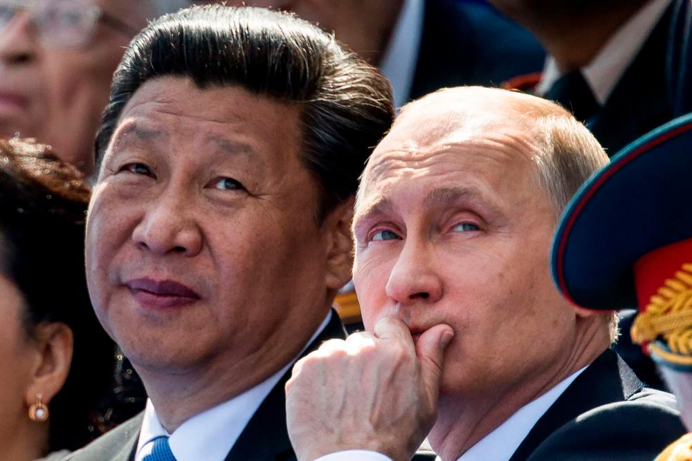 Xi, Putin hail ties ahead of ‘journey of peace’ to Moscow
