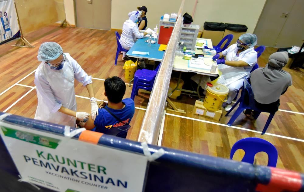 50 pct of Malaysia's adult population received booster dose