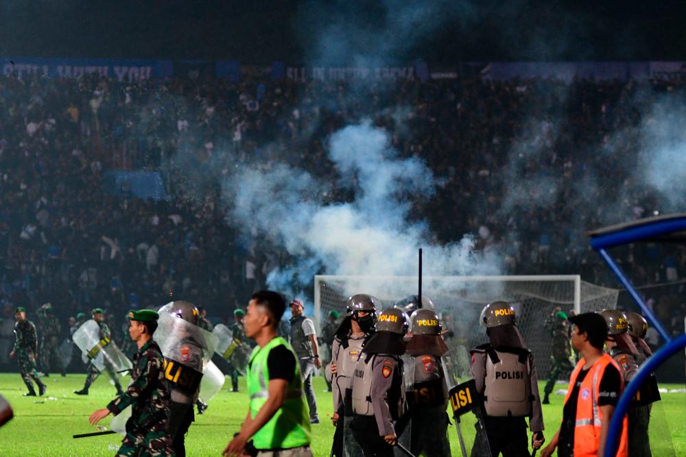 ‘Above the law’: Indonesia stampede puts focus on police force ‘Above the law’: Indonesia stampede puts focus on police force