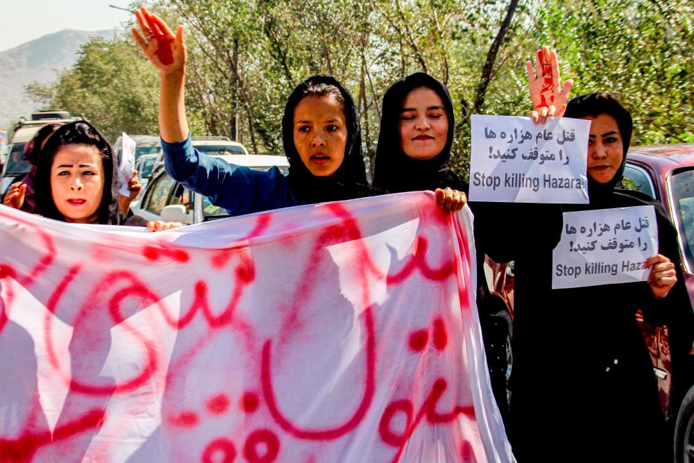 Afghan women protest Hazara ‘genocide’ after Kabul bombing Afghan women protest Hazara ‘genocide’ after Kabul bombing