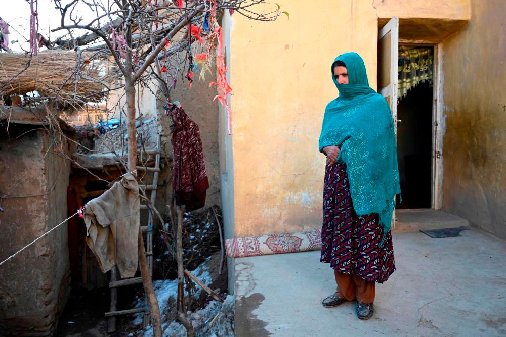 Afghanistan’s Taliban ban women from flying without male chaperone