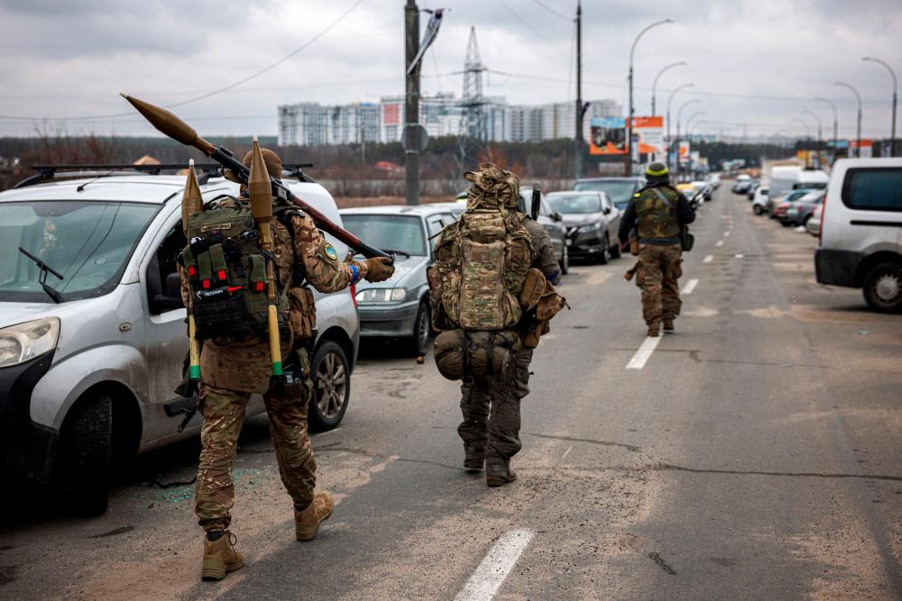 Air strike kills two in Kyiv ahead of new round of talks