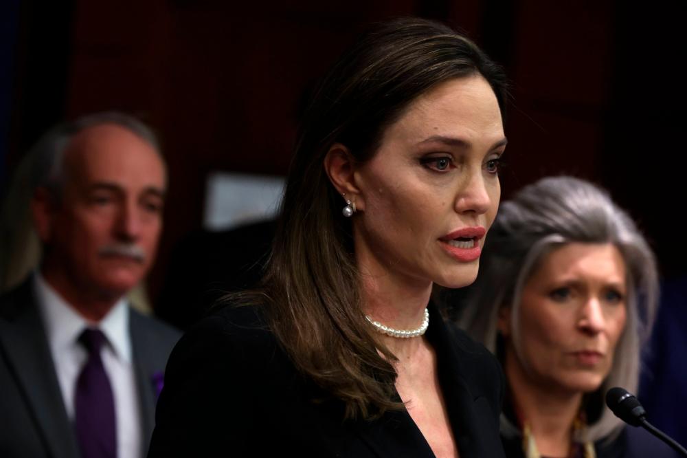 Angelina Jolie, at US Capitol, presses for domestic violence law