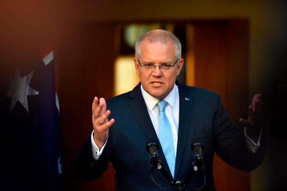 Australia sees remote chance of jail for India travel ban offenders