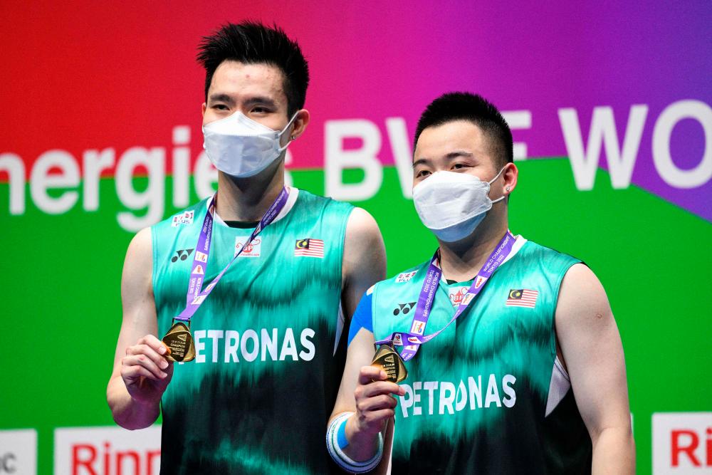 Badminton: Families of Aaron, Wooi Yik consider victory a National Day gift