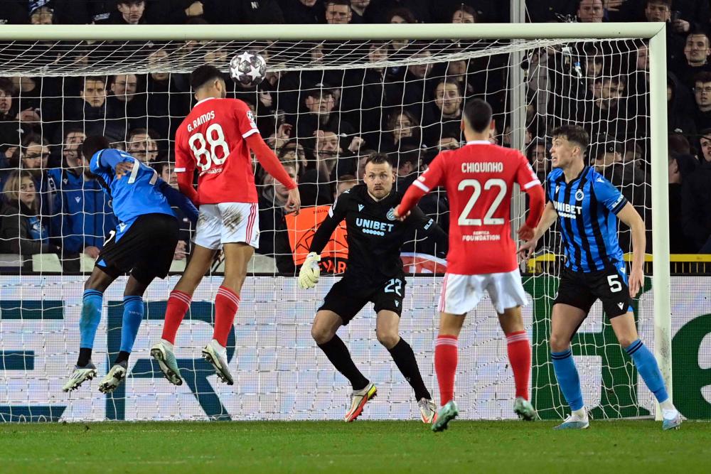 Benfica with one foot in Champions League quarters after beating Club Brugge