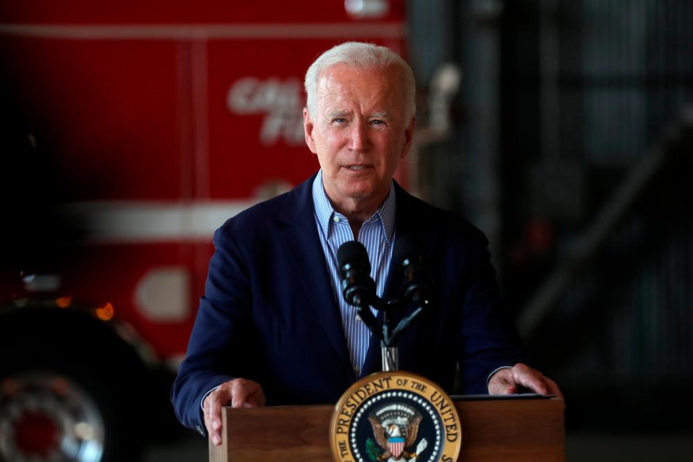 Biden pushes for investments to confront climate crisis on California stop of western US trip