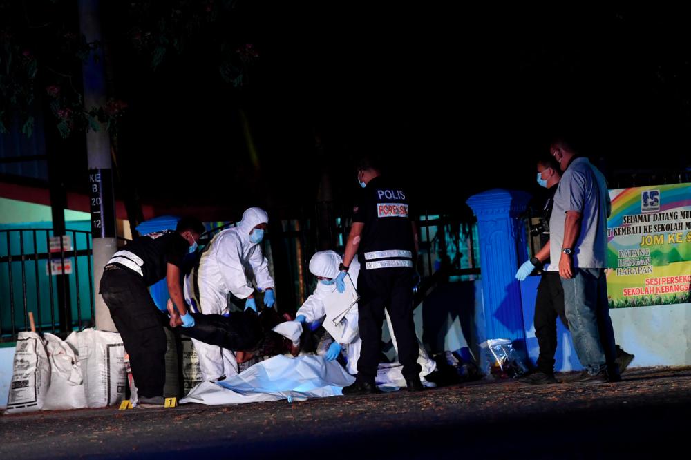 Body of man, believed to be murdered, discovered near school