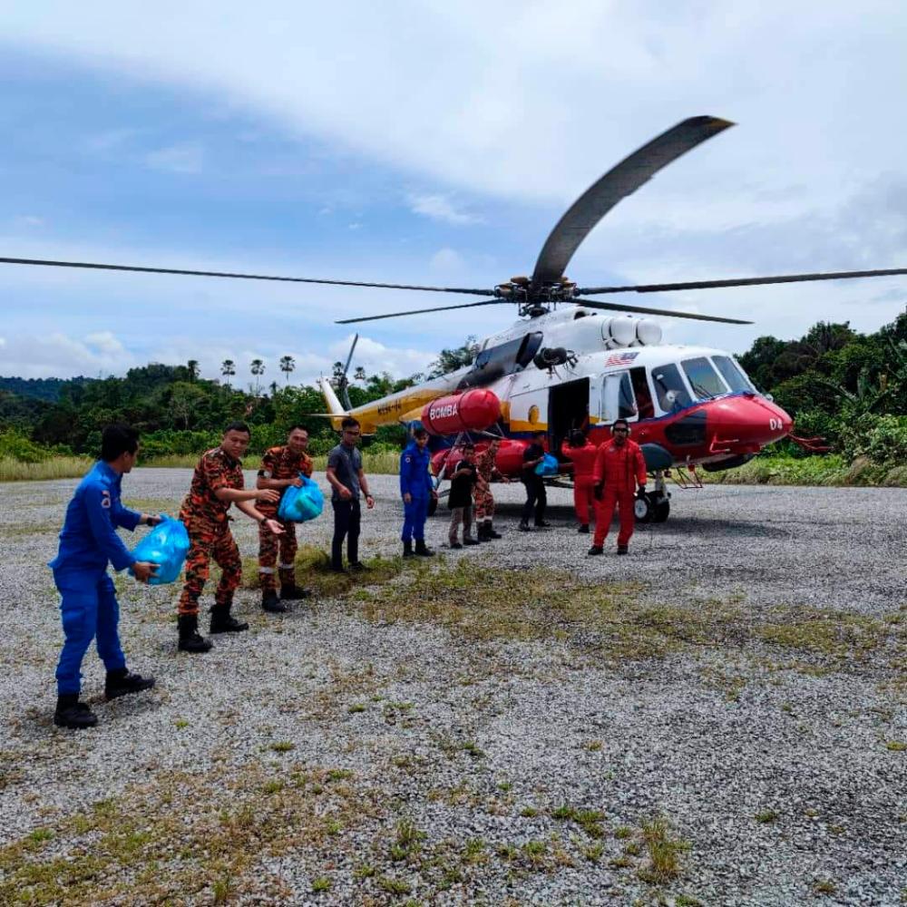 Bomba heli sends food aid to longhouses cut off by floods in Sarawak