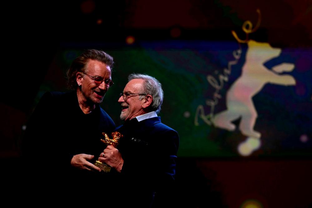 Bono presents Spielberg with Lifetime Award at Berlin Film Festival Bono presents Spielberg with Lifetime Award at Berlin Film Festival