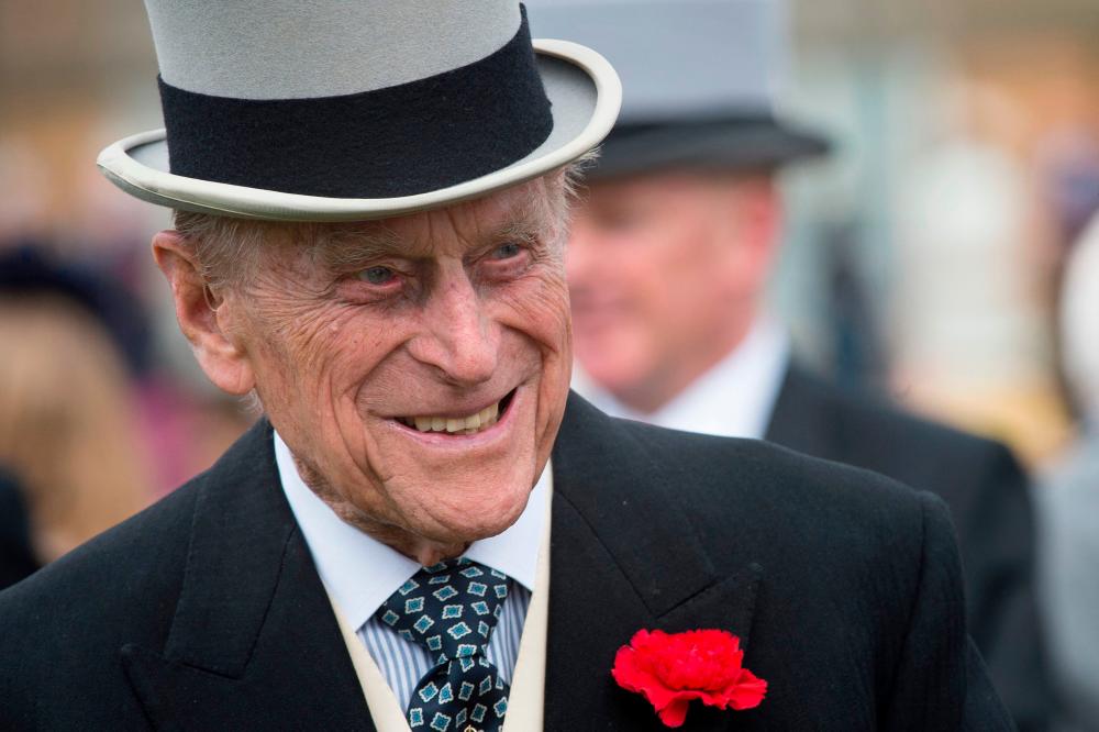 British Prime Minister Johnson reacts to death of Prince Philip