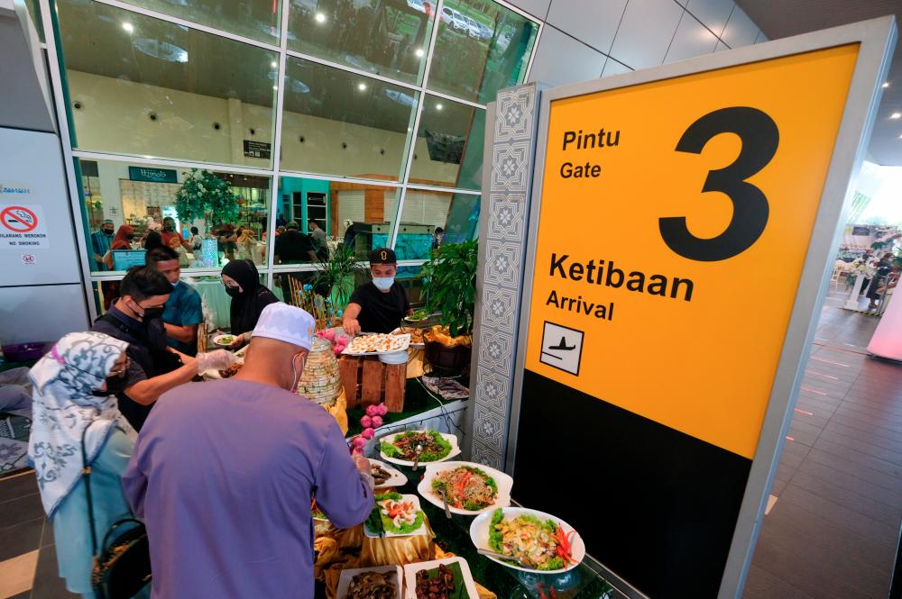 âBuka Puasaâ at Melaka airport to take away travel blues