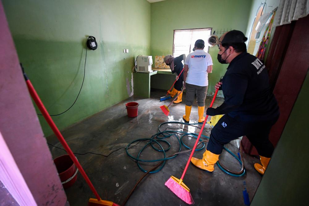 Businessman helps out with free wiring checks for flood victims
