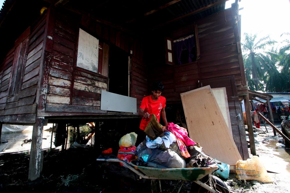 Changkat Jong residents tired of perennial house cleaning after flood