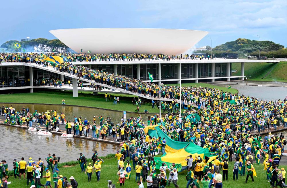 China says ‘firmly opposes violent attack’ on Brazil government buildings