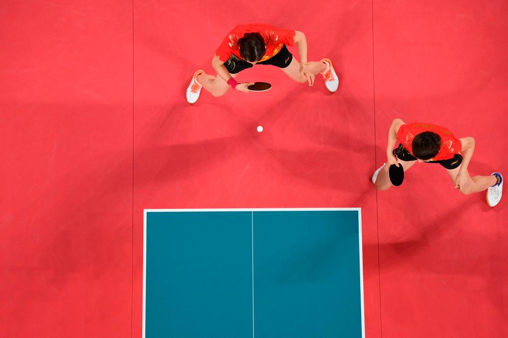 China women paddlers beat Japan for 4th consecutive Olympic table tennis team gold China women paddlers beat Japan for 4th consecutive Olympic table tennis team gold