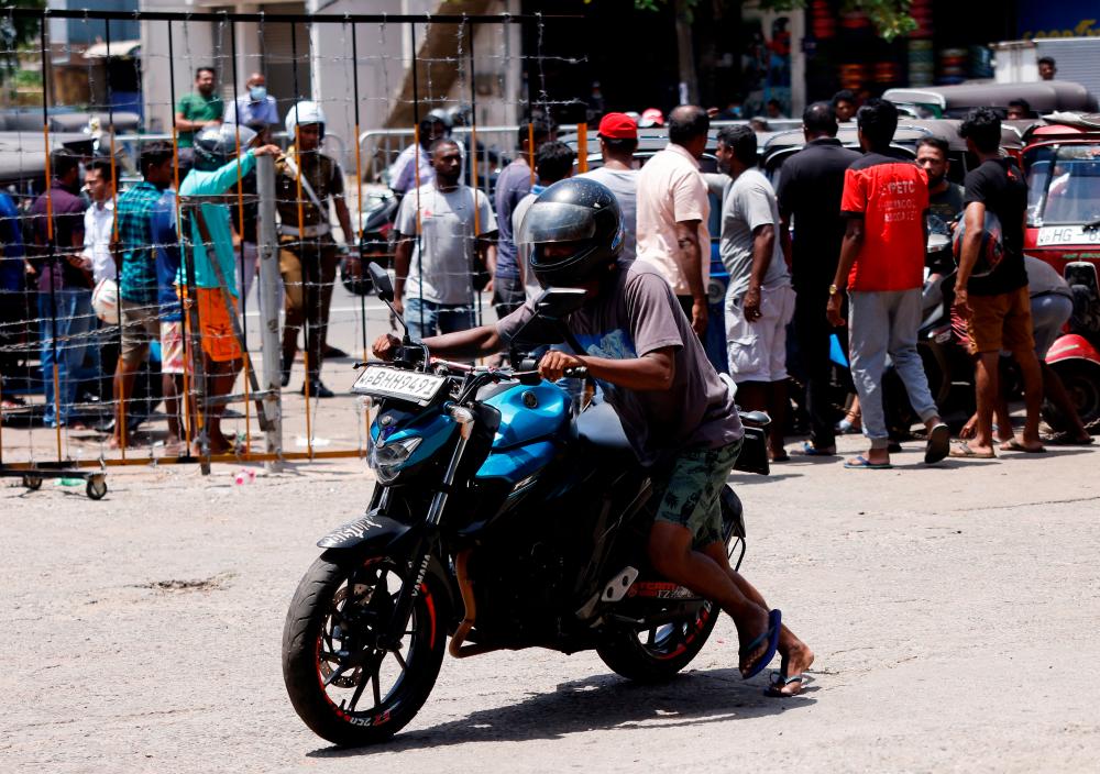 Crisis-hit Sri Lanka woos foreign oil firms amid fuel shortages Crisis-hit Sri Lanka woos foreign oil firms amid fuel shortages
