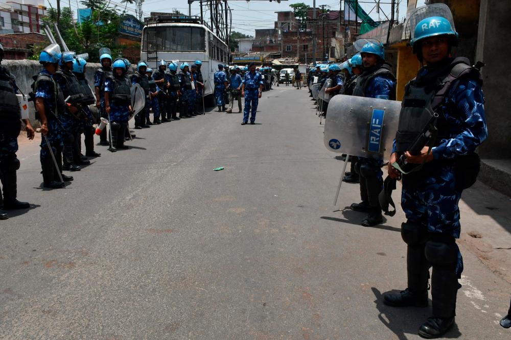 Death of girl set ablaze in India's Jharkhand state sparks anger