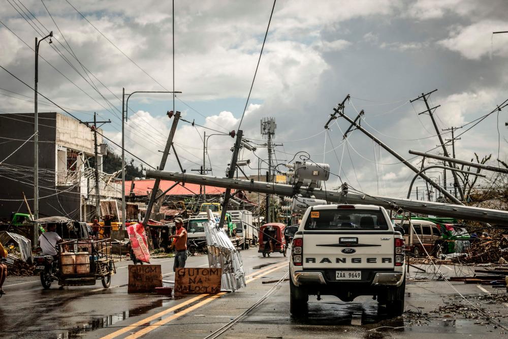 Death toll in Philippines typhoon hits 208 Death toll in Philippines typhoon hits 208