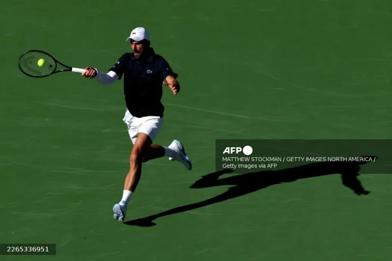 Djokovic battles back to win Indian Wells opener