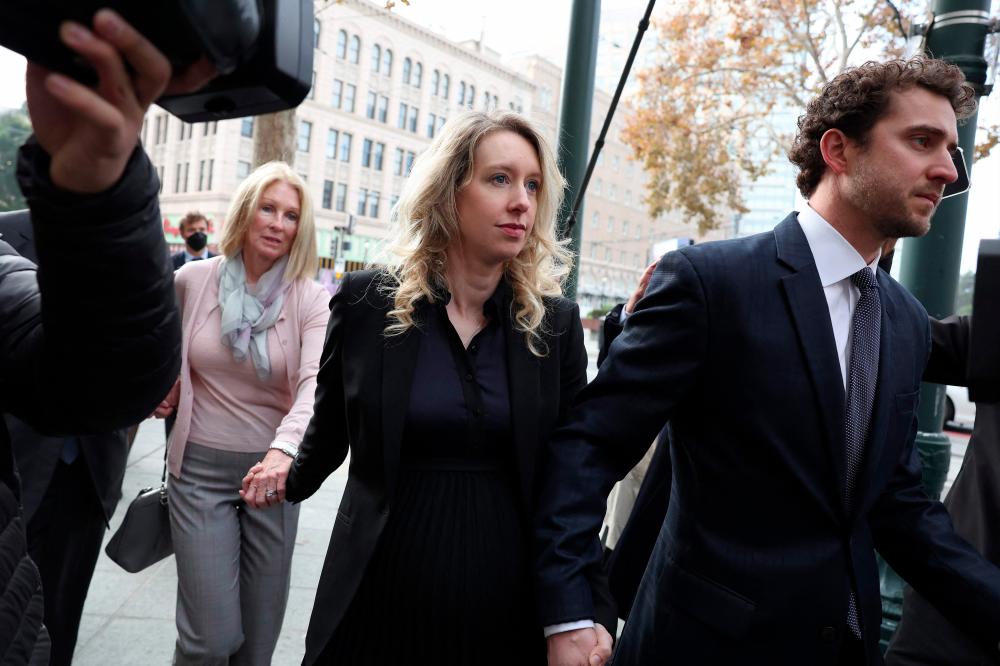 Elizabeth Holmes sentenced to 11 years in prison for Theranos fraud