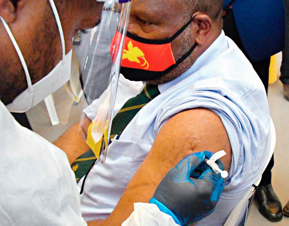 Facebook virus lies âbiggest challengeâ to PNG vaccine drive: minister