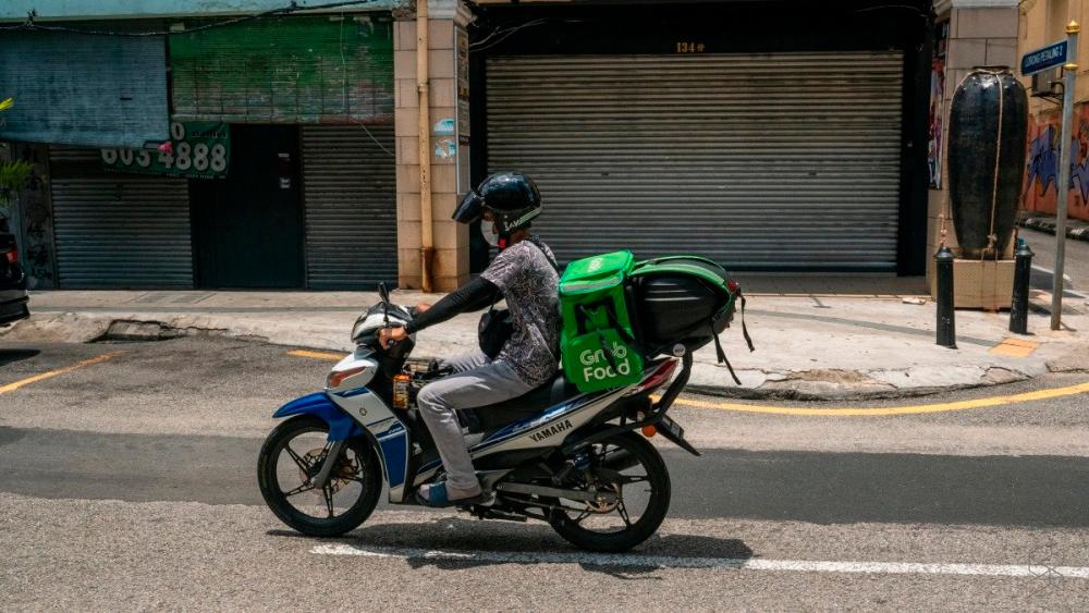 Family of deceased food delivery rider receive benefits under SOCSO scheme