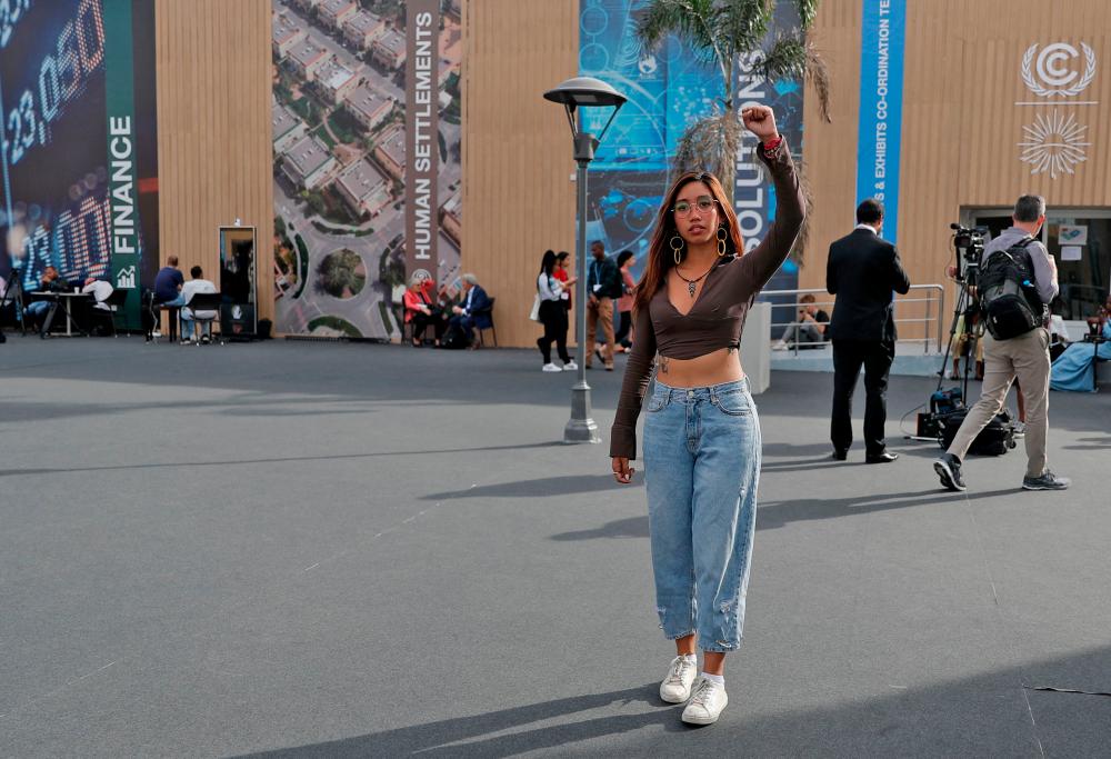 Filipina youth activist brings fight for climate finance justice to COP27