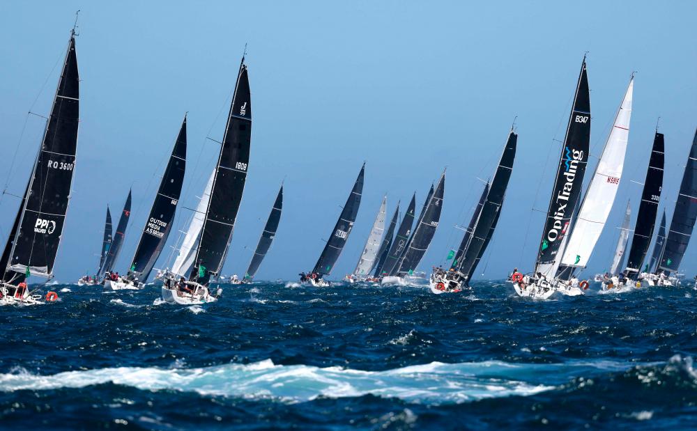 Fleet sails south from Sydney Harbour to Hobart in 2022 Yacht Race Fleet sails south from Sydney Harbour to Hobart in 2022 Yacht Race